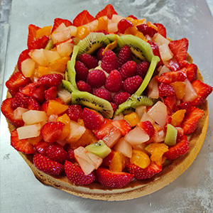 Photo d'une tarte aux fruits maison réalisé par la Boulangerie Patisserie La colline des hauts bocages vendéens à Mouchamps près des Herbiers et Chantonnay